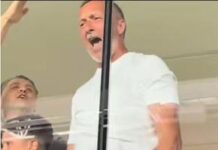 MM Stoica a reacționat la evenimentul surprins la oficială mm-stoica-s-a-dezlantuit,-a-sarit-si-si-a-ridicat-tricoul.-imagini-nebune-surprinse-la-oficiala